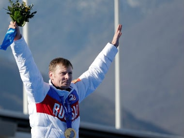 Russia's pilot Alexander Zubkov poses with a gold medal during a ceremony for the four-man bobsleigh event at the Sochi 2014 Winter Olympics. Reuters