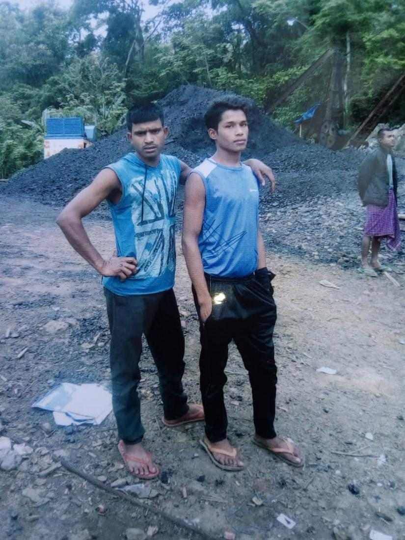 Miners Amir Hussain and Moinul Islam at the coal mining site before getting trapped inside on Thursday. Image Courtest: 101Reporters