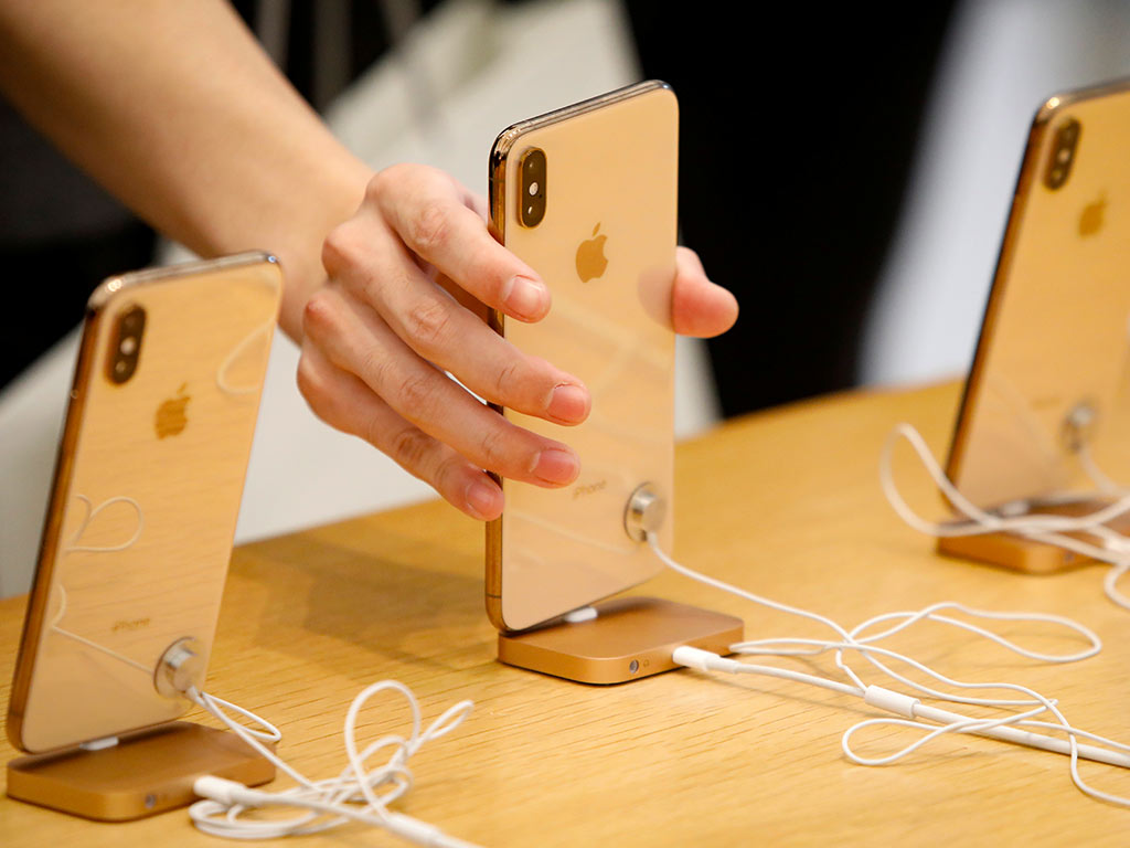 Apple reduces planned production for its new iPhones by 10 percent: Report Apple reduces planned production for its new iPhones by 10 percent: Report