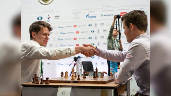 World Blitz Championship: Vladislav Artemiev, Magnus Carlsen take lead; Viswanathan Anand experiences mixed Day 1