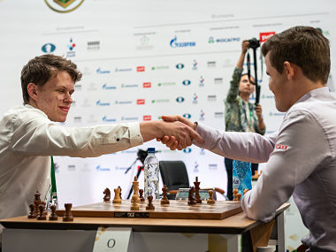 World Blitz Championship: Vladislav Artemiev, Magnus Carlsen take lead; Viswanathan Anand experiences mixed Day 1 World Blitz Championship: Vladislav Artemiev, Magnus Carlsen take lead; Viswanathan Anand experiences mixed Day 1