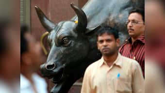 Stocks finish with modest gains after choppy session amid crucial RBI board meet under new governor