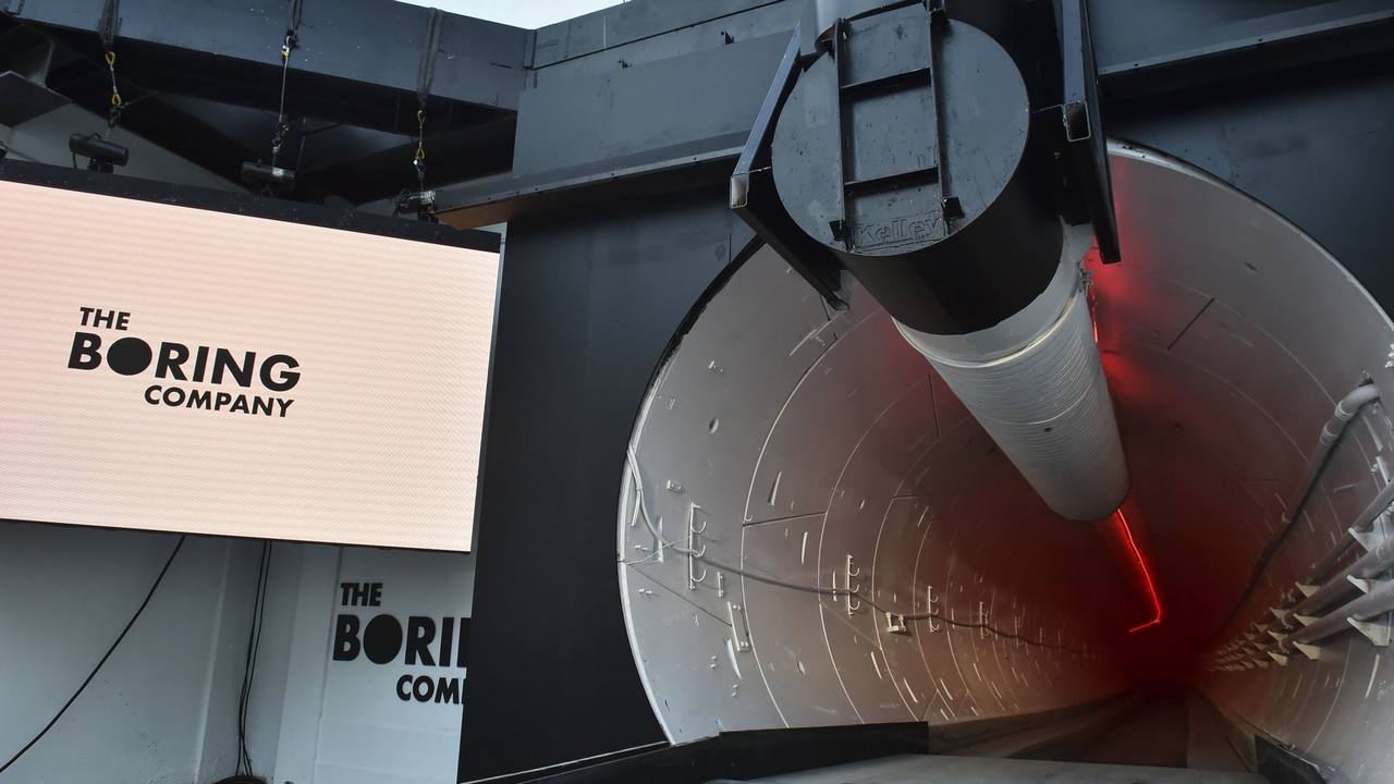 The Boring Co. signage is displayed at the tunnel entrance before an unveiling event for the Boring Co. Image: AP