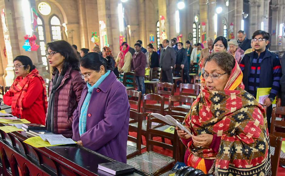 As the clock struck 12 at night, priests came in a procession to announce the birth of Jesus. Children carried candles and the Holy Bible in the procession. PTI As the clock struck 12 at night, priests came in a procession to announce the birth of Jesus. Children carried candles and the Holy Bible in the procession. PTI