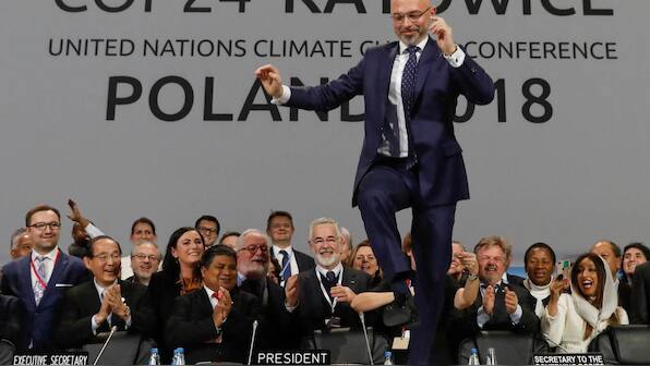 UN COP24 talks end with nations adopting new 'rulebook' to act on Paris climate deal