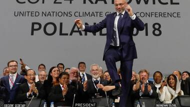 UN COP24 talks end with nations adopting new 'rulebook' to act on Paris climate deal
