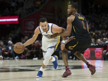 Golden State Warriors guard Stephen Curry (30) drives to the basket against Cleveland Cavaliers guard Rodney Hood (1) during the first half at Quicken Loans Arena. Reuters