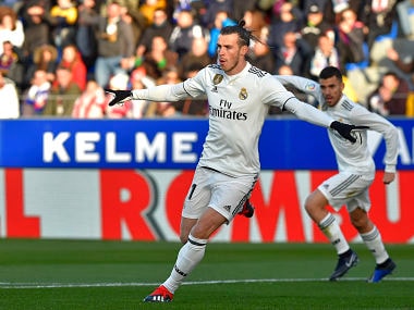 Real Madrid's Gareth Bale (centre) celebrates after scoring against SD Huesca. AFP