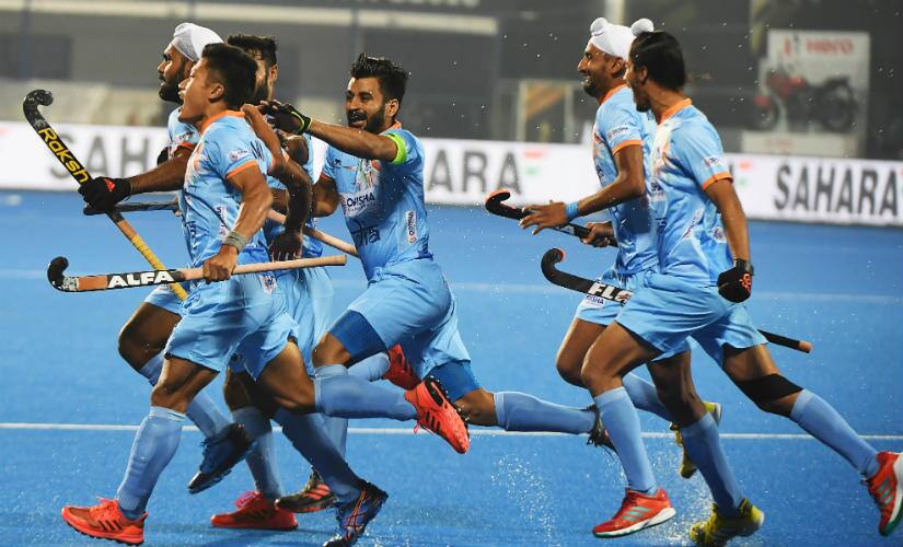 India celebrate their second goal against Belgium on Sunday. AFP