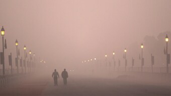 Firefighters called to battle air pollution in Delhi by spraying water from rooftops