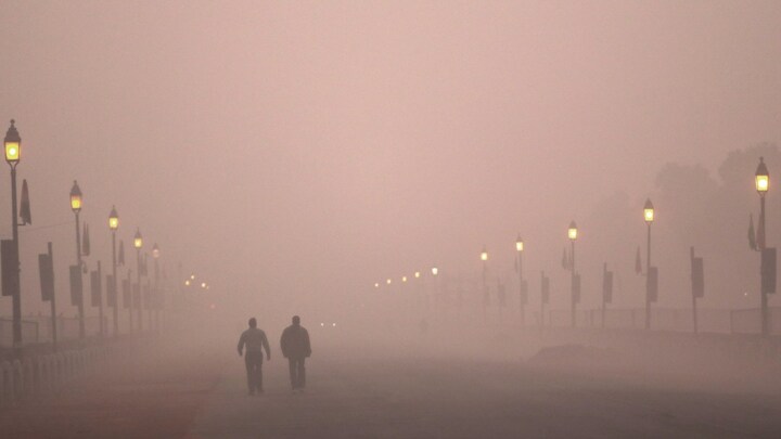 Firefighters called to battle air pollution in Delhi by spraying water from rooftops