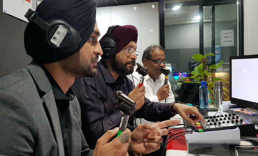 Jagbir Singh (Centre) is a TV commentator now. Image: Twitter/ @jagbirolympian