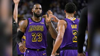 NBA: LeBron James goes off injured in Los Angeles Lakers' surprise rout of Golden State Warriors