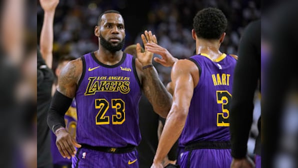 NBA: LeBron James goes off injured in Los Angeles Lakers' surprise rout of Golden State Warriors