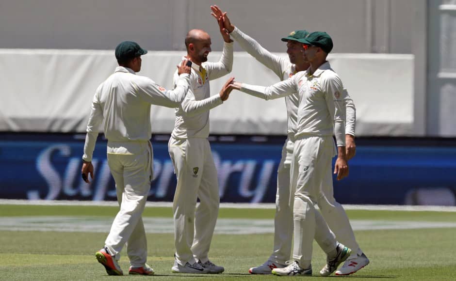 Australian players celebrate the dismissal of India’s Rishabh Pant during play in the second cricket test between Australia and India in Perth, Australia, Tuesday, Dec. 18, 2018. (AP Photo/Trevor Collens)