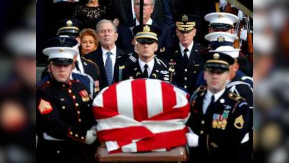 America bids farewell to George HW Bush: Son George W Bush calls him 'brightest of a thousand points of light'