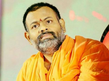 Telangana elections: BJP brings Swami Paripoornananda into fold, adopts well-calibrated Hindutva plank against TRS, Congress Telangana elections: BJP brings Swami Paripoornananda into fold, adopts well-calibrated Hindutva plank against TRS, Congress