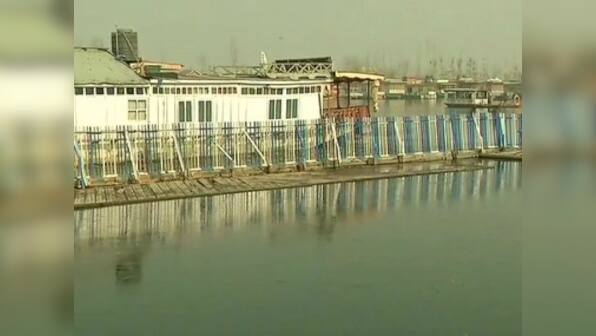 Cold wave intensifies accross Kashmir as mercury slips below freezing point; water bodies, supply lines turn ice