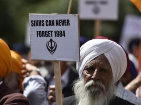 Drawing parallels between 1984 anti-Sikh riots and post-Godhra killings in 2002 specious; the two are different tragedies Drawing parallels between 1984 anti-Sikh riots and post-Godhra killings in 2002 specious; the two are different tragedies