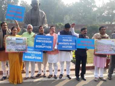 Karnataka MPs protest inside Parliament complex, demand construction of Mekedattu Dam on Cauvery river Karnataka MPs protest inside Parliament complex, demand construction of Mekedattu Dam on Cauvery river