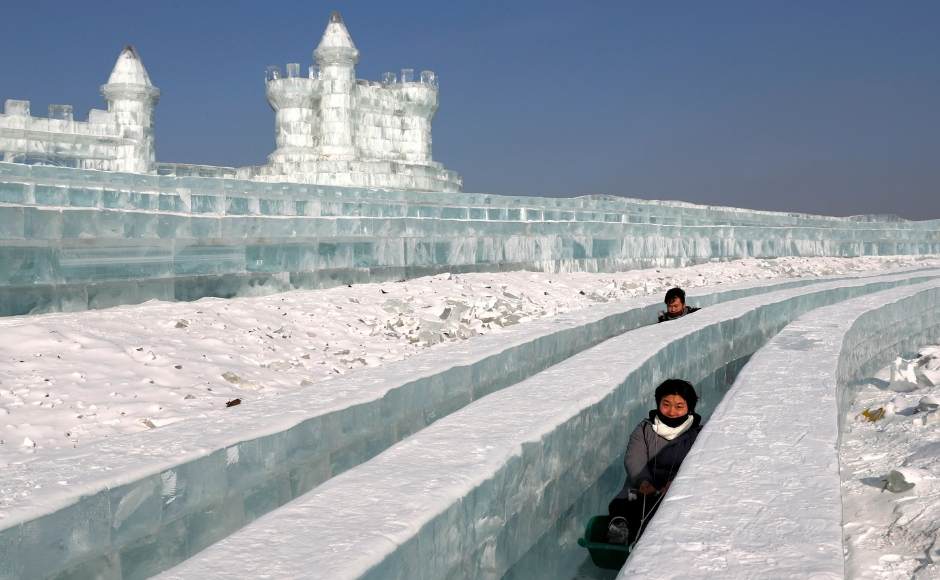 Highlights of the festival include sled rides on the Songhua river, mass weddings, and towering sculptures of ice and snow carved by thousands of artists and workers. Reuters Highlights of the festival include sled rides on the Songhua river, mass weddings, and towering sculptures of ice and snow carved by thousands of artists and workers. Reuters