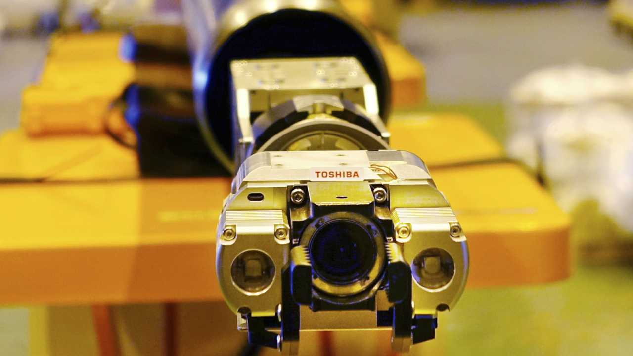 Toshiba designs robot to probe depths of Japan's melted Fukushima nuclear reactor Toshiba designs robot to probe depths of Japan's melted Fukushima nuclear reactor