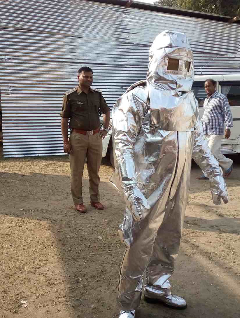 A firefighter wears an anti-heat suit during a drill. Image Courtesy: Saurabh Sharma
