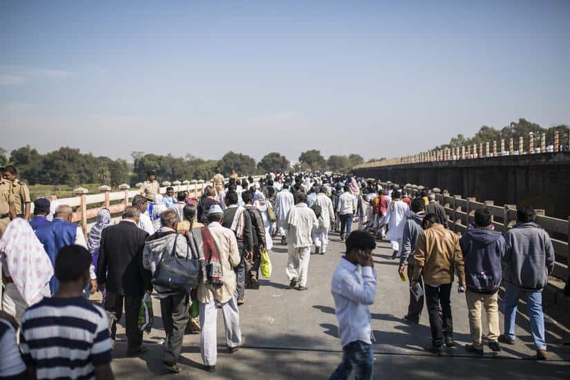 People walking back from the memorial over the bridge across the Bhima river. Image Courtesy: Shrirang Swarge