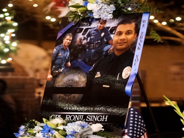 Slain Indian-origin police officer Ronil Singh honoured with funeral procession taken through two California towns Slain Indian-origin police officer Ronil Singh honoured with funeral procession taken through two California towns