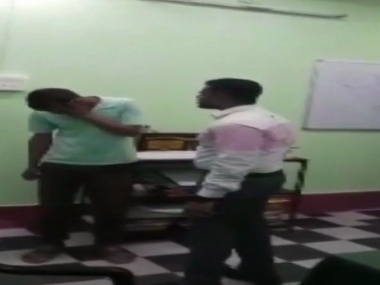 West Bengal: Alipurduar DM thrashes man in police station for making 'lewd' comments about his wife; asked to go on leave West Bengal: Alipurduar DM thrashes man in police station for making 'lewd' comments about his wife; asked to go on leave