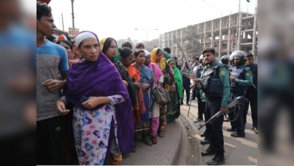 Bangladesh Police resort to violence as garment workers protest over low wages; water cannons, tear gas used to disperse crowds