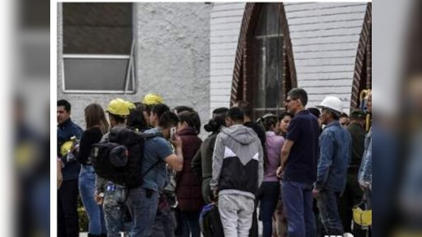 Car bomb attack at Colombia police cadet training academy leaves 21 dead; government declares three days of mourning
