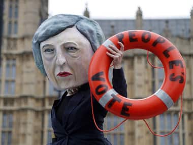 Brexit falls through, Theresa May awaits no-confidence vote: Investors advised not to take directional views on sterling, gilts or UK stocks