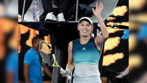 Australian Open 2019: Emotional Caroline Wozniacki starts title defence with easy win over Alison Van Uytvanck