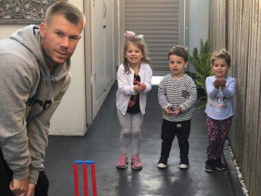 File image of David Warner and his children. Twitter @CandyFalzon