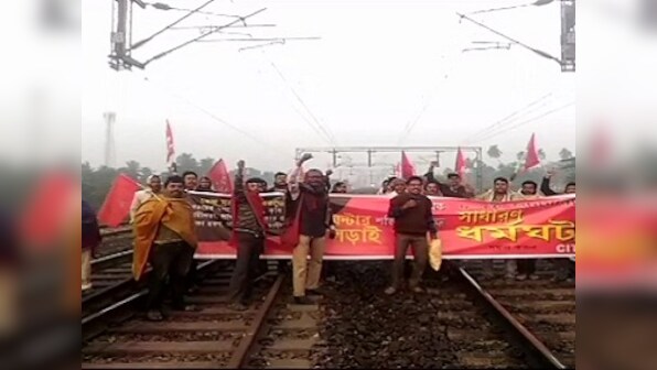Bharat bandh: Transport workers join trade union strike demanding minimum wage; schools shut in Karnataka; protests in Bengal, Odisha, Assam