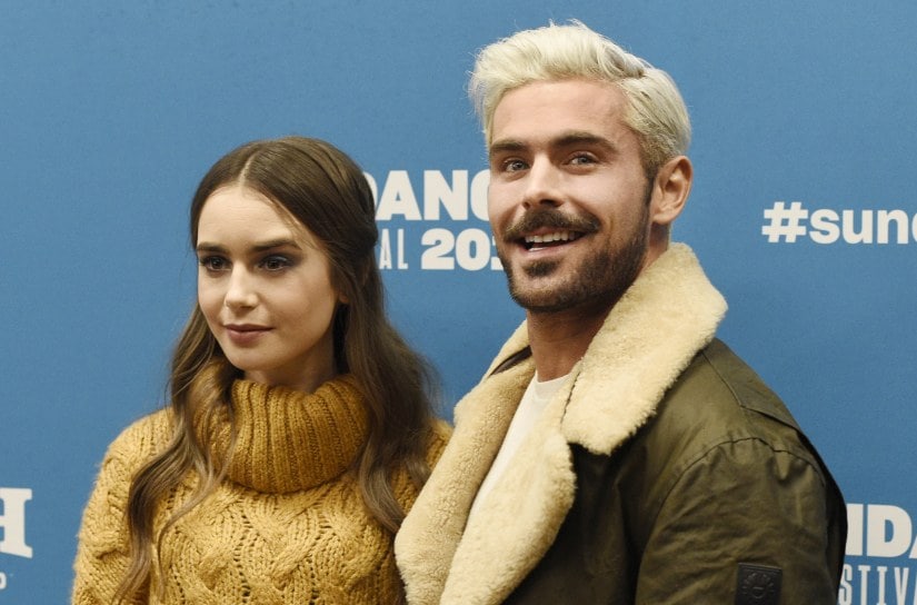 Lily Collins, left, and Zac Efron, cast members in "Extremely Wicked, Shockingly Evil and Vile," pose together at the premiere of the film during the 2019 Sundance Film Festival, Saturday, Jan. 26, 2019, in Park City, Utah. (Photo by Chris Pizzello/Invision/AP)