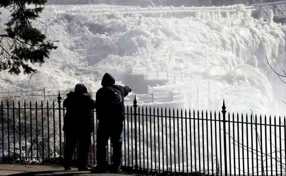 At least four deaths were linked to the weather system by Wednesday. Ice is seen on the side of the Great Falls National Historic Park in Paterson New Jersey. AP At least four deaths were linked to the weather system by Wednesday. Ice is seen on the side of the Great Falls National Historic Park in Paterson New Jersey. AP