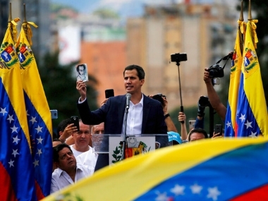Venezuela crisis: 25 countries pledge $100 million in humanitarian aid; country's military reinforces blockade at border Venezuela crisis: 25 countries pledge $100 million in humanitarian aid; country's military reinforces blockade at border