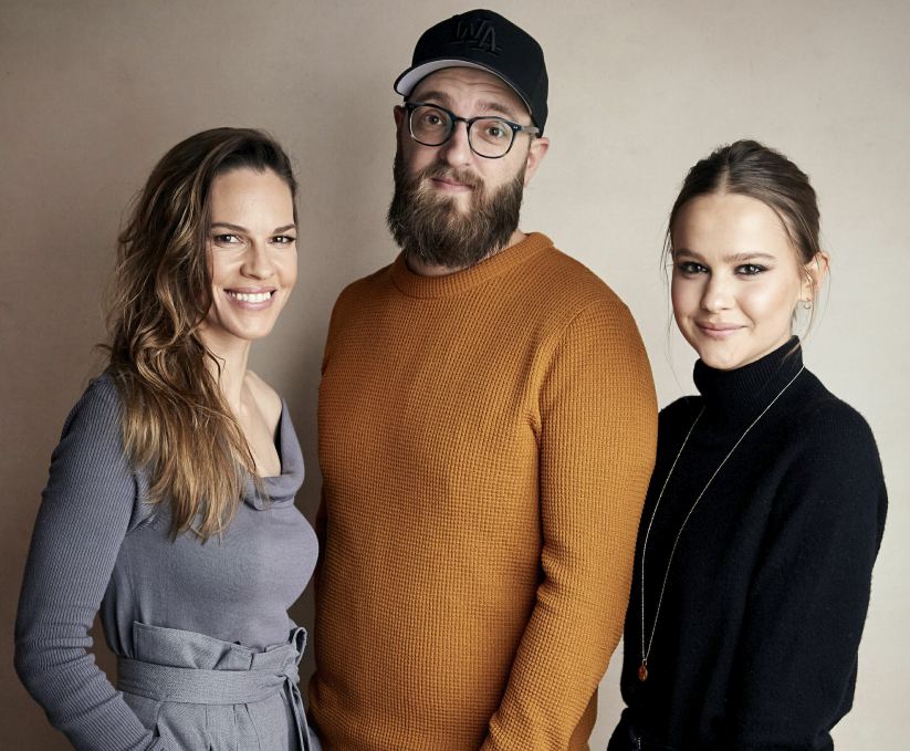 Hilary Swank, from left, director Grant Sputore, and Clara Rugaard pose for a portrait to promote the film "I Am Mother" at the Salesforce Music Lodge during the Sundance Film Festival on Saturday, Jan. 26, 2019, in Park City, Utah. (Photo by Taylor Jewell/Invision/AP)