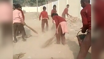Students of this government school in UP's Chiraigaon village forced to clean their school premises