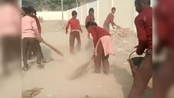 Students of this government school in UP's Chiraigaon village forced to clean their school premises