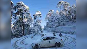 Heavy snowfall results in cancellations of 15 flights to Srinagar; Jammu-Srinagar highway closed after landslides