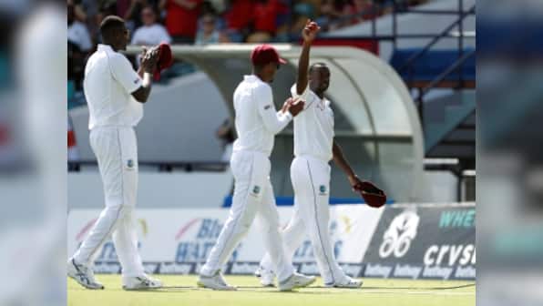 West Indies vs England: Pacer Kemar Roach routs visitors for 77 as 18 wickets fall on second day of Bridgetown Test