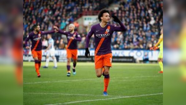 Premier League: Manchester City keep pace with leaders Liverpool with comfortable win at Huddersfield