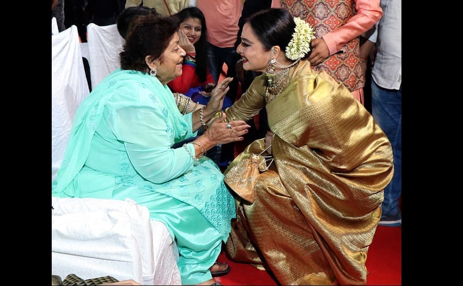 Rekha in a conversation with choreographer Saroj Khan during the event.