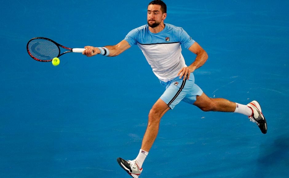 Last year's Australian Open runner-up Marin Cilic wasted little time in reaching the second round with a 6-2, 6-4, 7-6 (7/3) win over Australian Bernard Tomic. AP Last year's Australian Open runner-up Marin Cilic wasted little time in reaching the second round with a 6-2, 6-4, 7-6 (7/3) win over Australian Bernard Tomic. AP