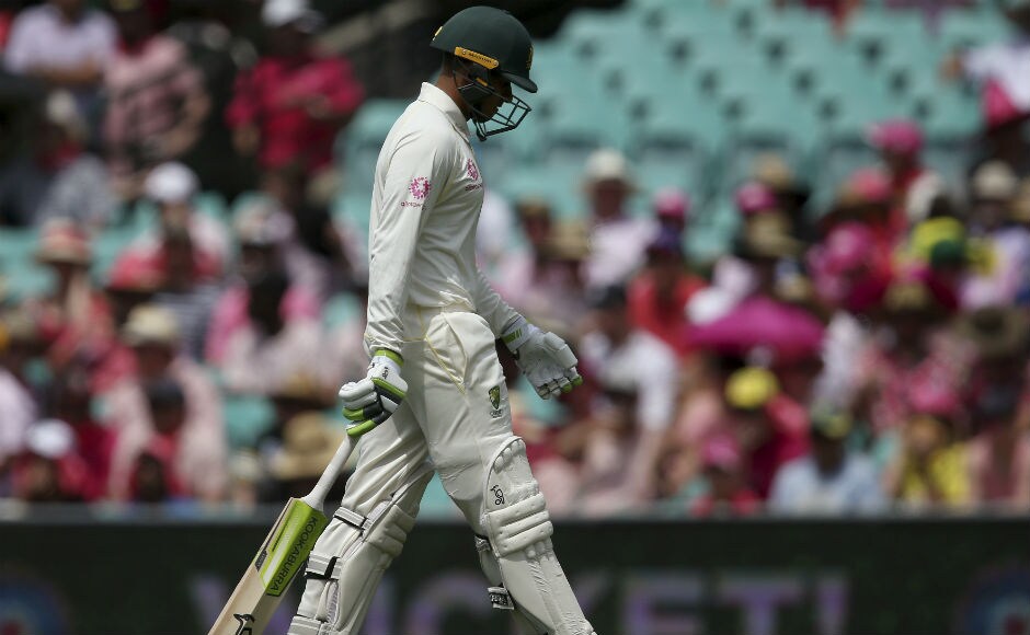 Australia's Usman Khawaja, dropped on naught on Day 2 by Rishabh Pant, walks off after he was caught out for 27 runs on Saturday. AP Australia's Usman Khawaja, dropped on naught on Day 2 by Rishabh Pant, walks off after he was caught out for 27 runs on Saturday. AP