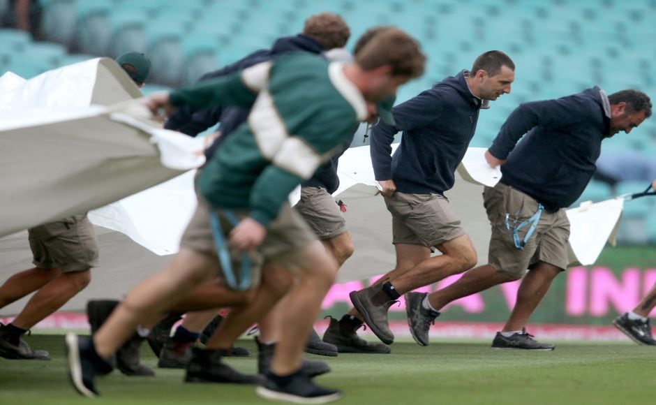 Rains played spoilsport on Day 4 as well. The groundsmen were busy covering and uncovering the pitch as the rain played hide and seek. AP Rains played spoilsport on Day 4 as well. The groundsmen were busy covering and uncovering the pitch as the rain played hide and seek. AP