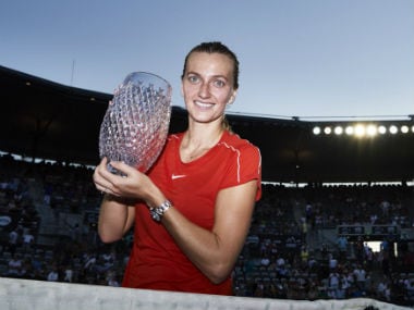 Petra Kvitova poses with the Sydney International trophy. Twitter: @petra_kvitova